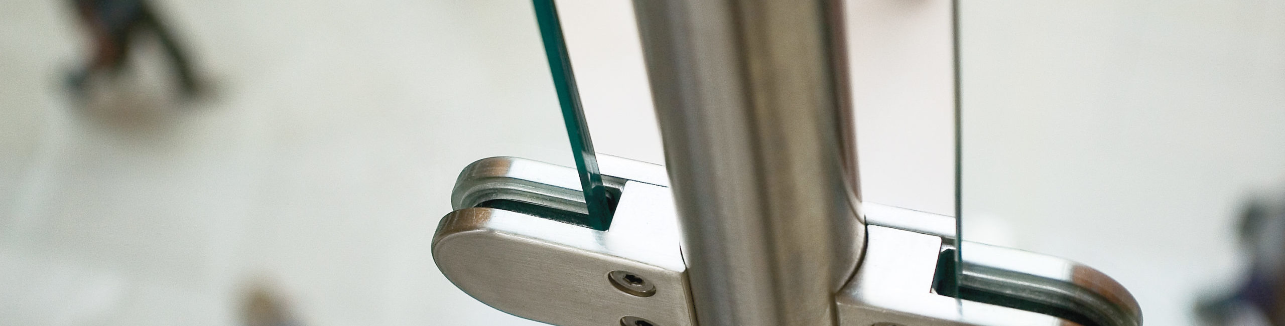 Metal Fittings of glass fence in modern building